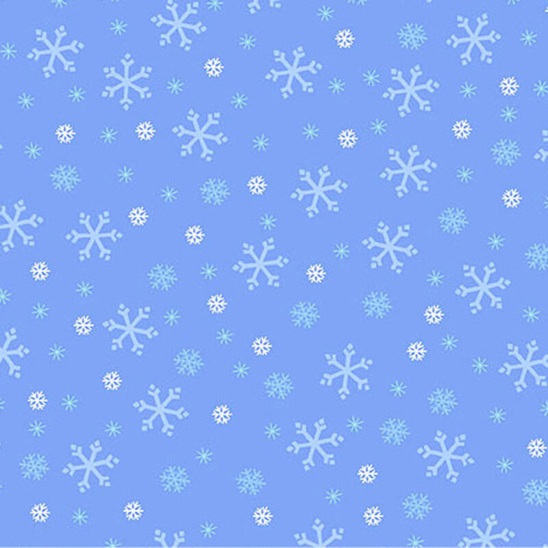 Periwinkle blue fabric with tossed white, tonal blue, and cyan snowflake designs.