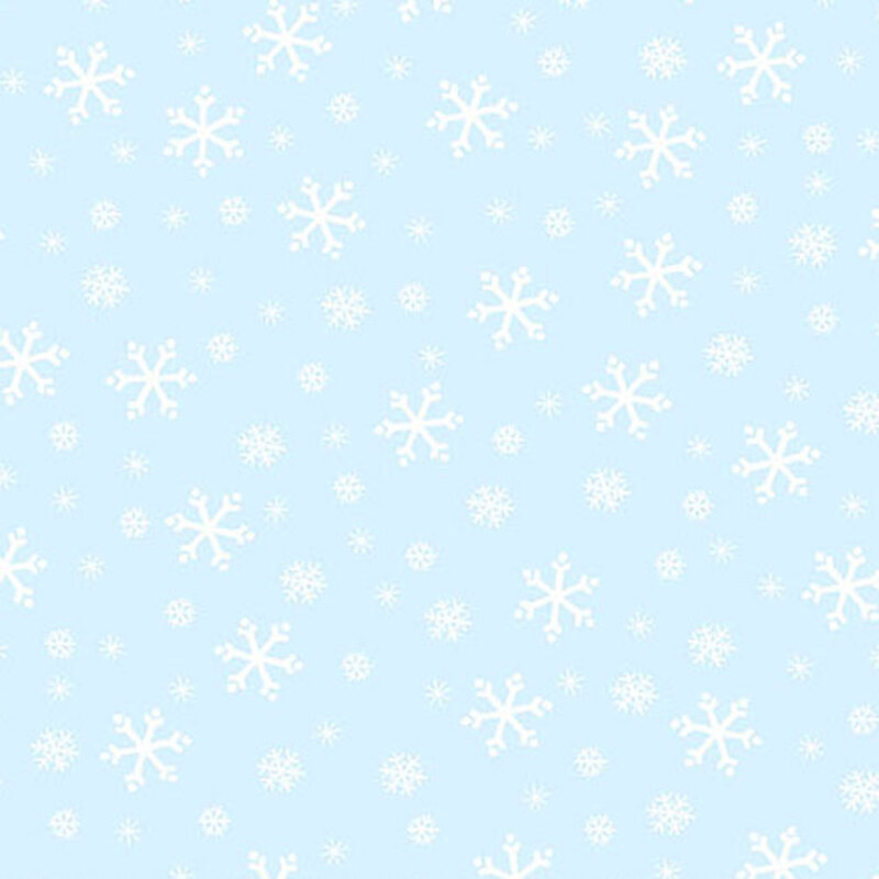 Powder blue fabric with tossed white, tonal light blue, and cyan snowflake designs.