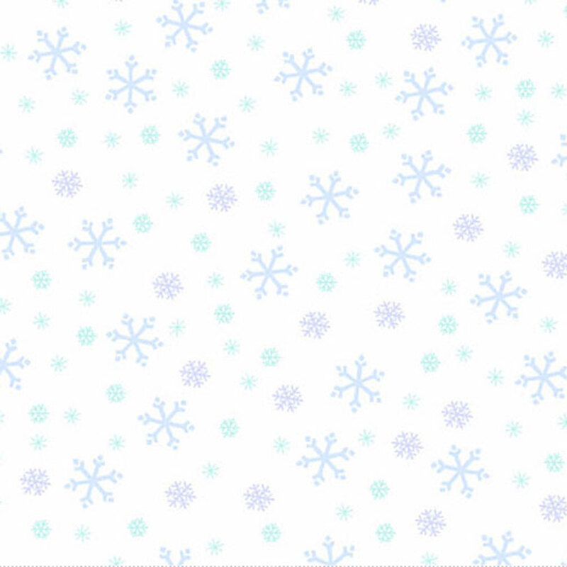 White fabric with tossed blue and cyan snowflake designs.