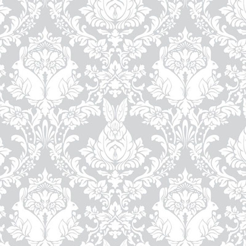 Patterned wallpaper featuring white rabbits and floral designs on a light gray background.