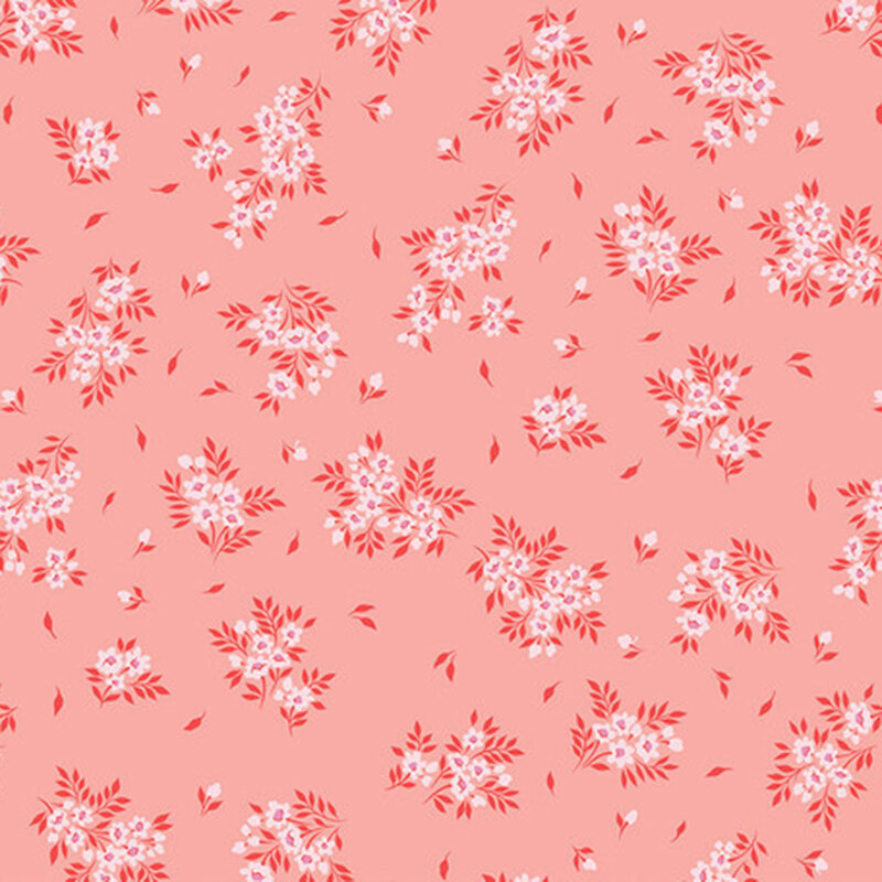 Pink background with scattered red and white floral patterns and green leaves.