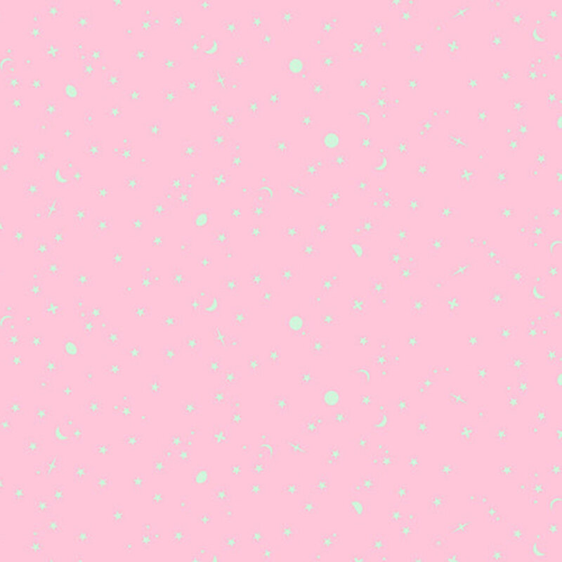 Light green stars, moons, and dots scattered across a soft pink fabric.