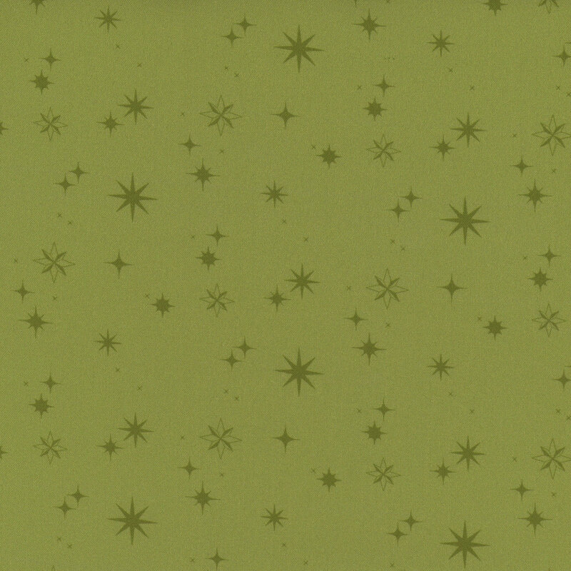 Green fabric with variously sized and shaped dark green stars scattered throughout.