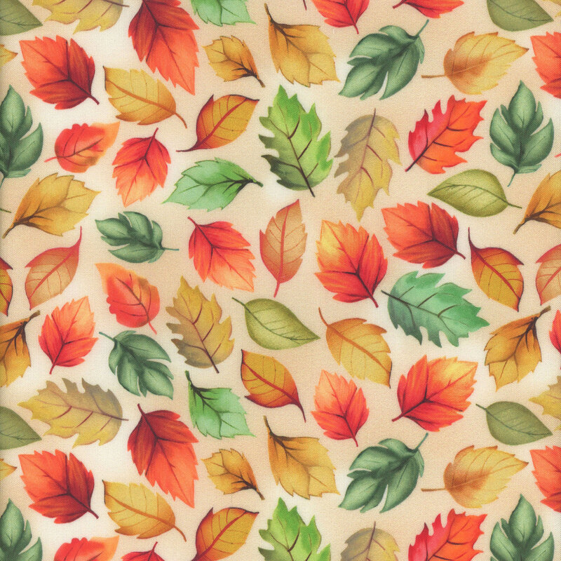 Colorful autumn leaves in various shapes scattered on a light beige fabric.