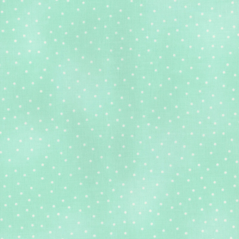 Small pinprick dots scattered across a mottled bright aqua background.