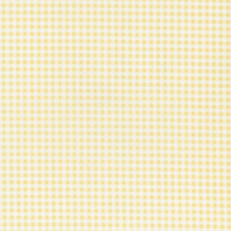 White and bright pastel yellow gingham fabric.