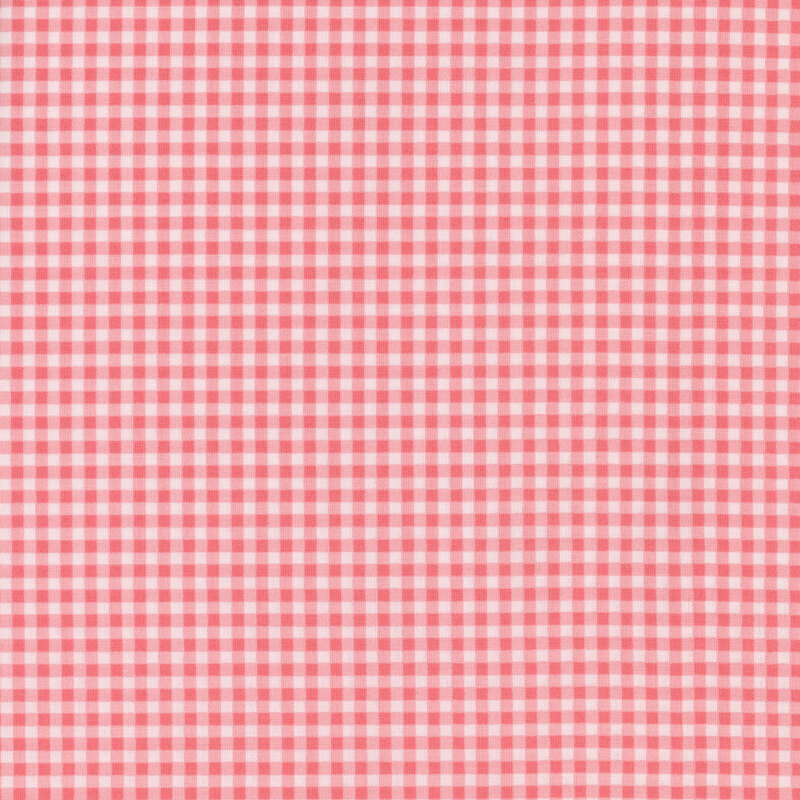 White and bright pink gingham fabric.