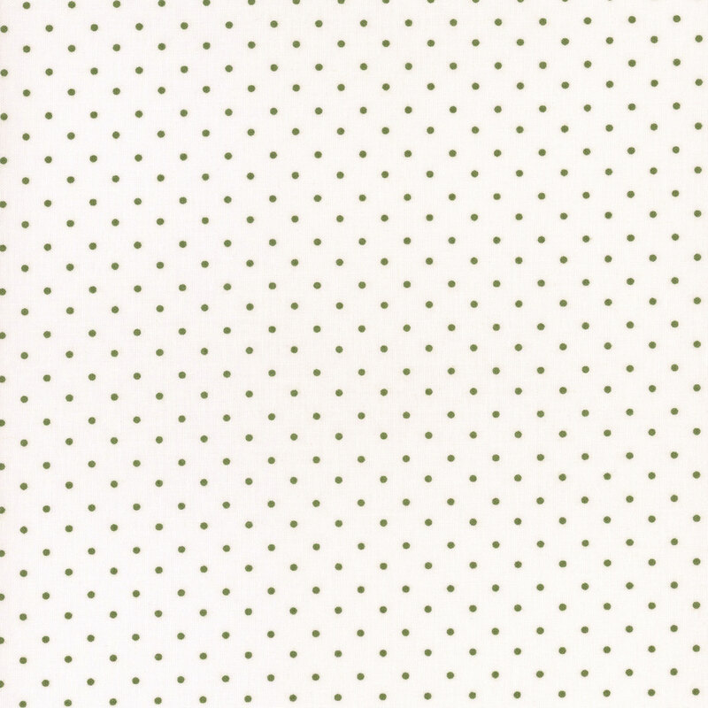 White fabric with an even pattern of green polka dots.