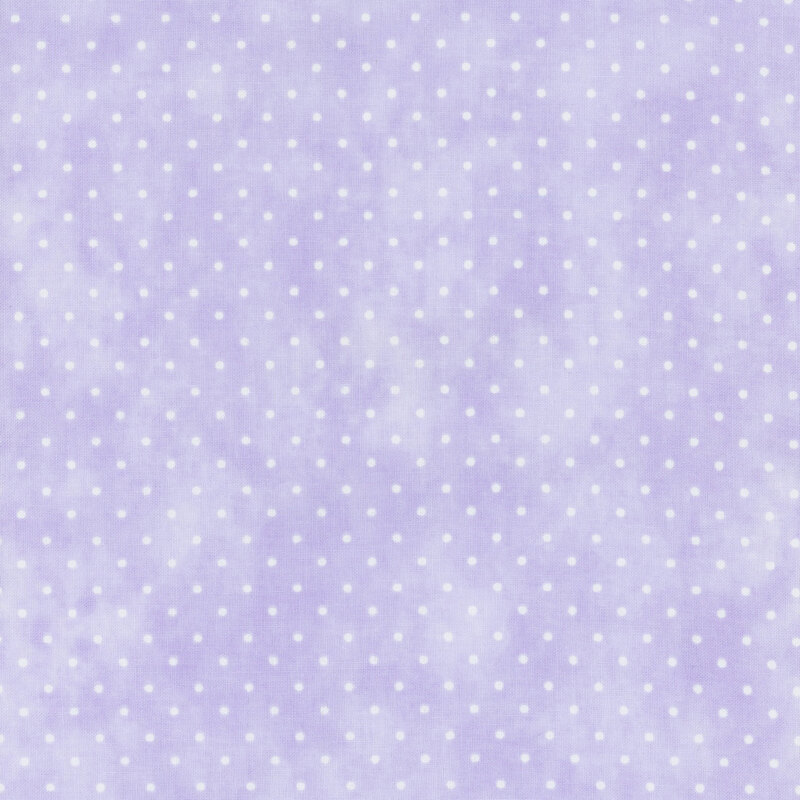 Mottled pastel purple fabric with an even pattern of polka dots.