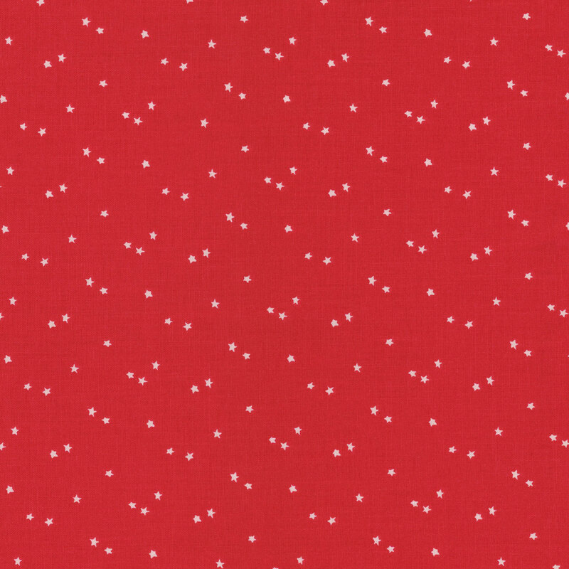 Red fabric with a scattered pattern of small white stars.