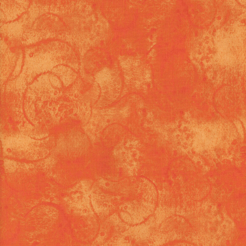 Abstract orange fabric with a pattern of lighter swirls and circular shapes.