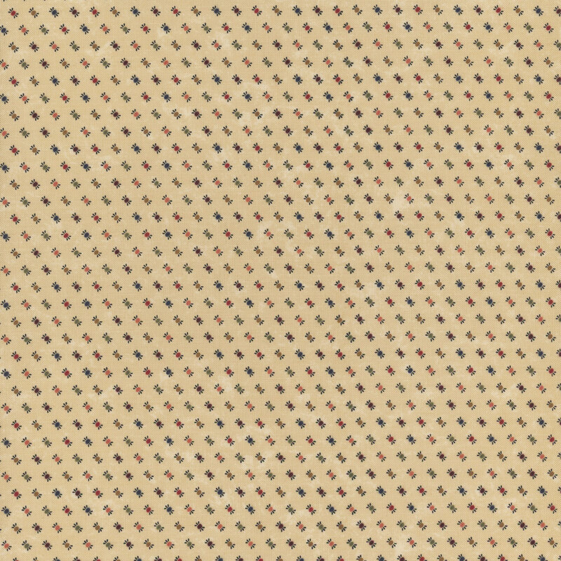 Tan fabric with a repeating pattern of small red, blue, and black crosses.