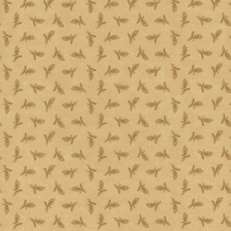 Tan fabric with a repeated pattern of wheat sheaves in a rust color. A ruler is shown at the bottom.