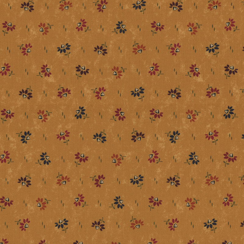 Tan fabric with a small floral pattern in red, blue, and yellow, featuring a ruler along the bottom.