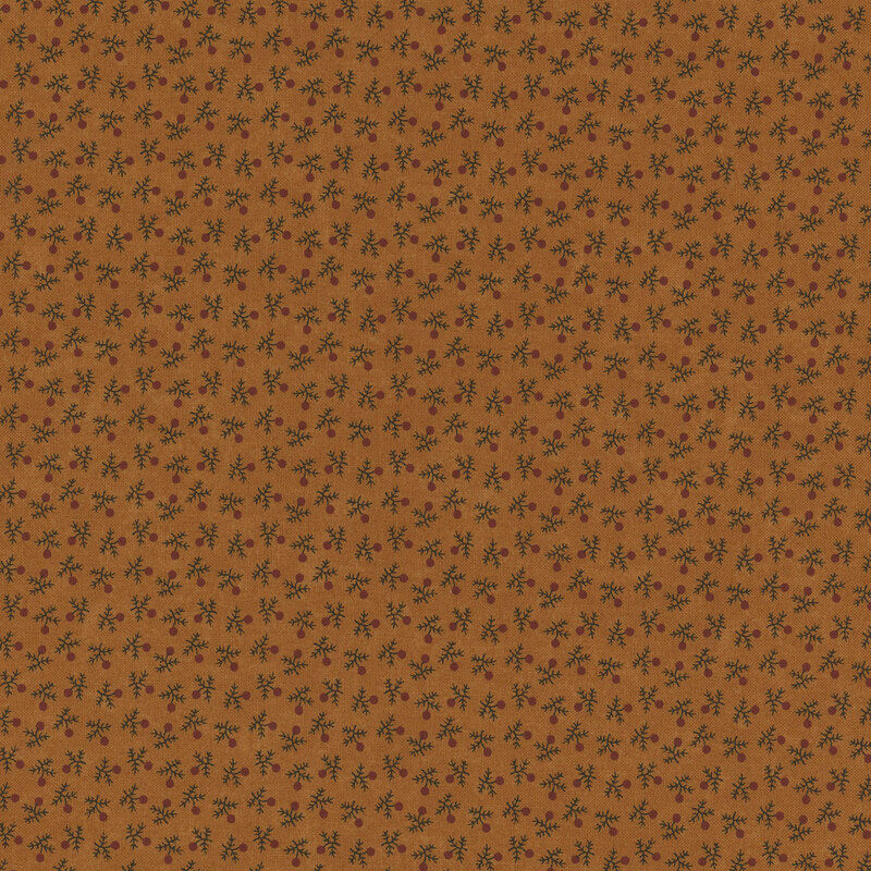 Brown fabric with a small, repeating black floral pattern, featuring a ruler for scale.