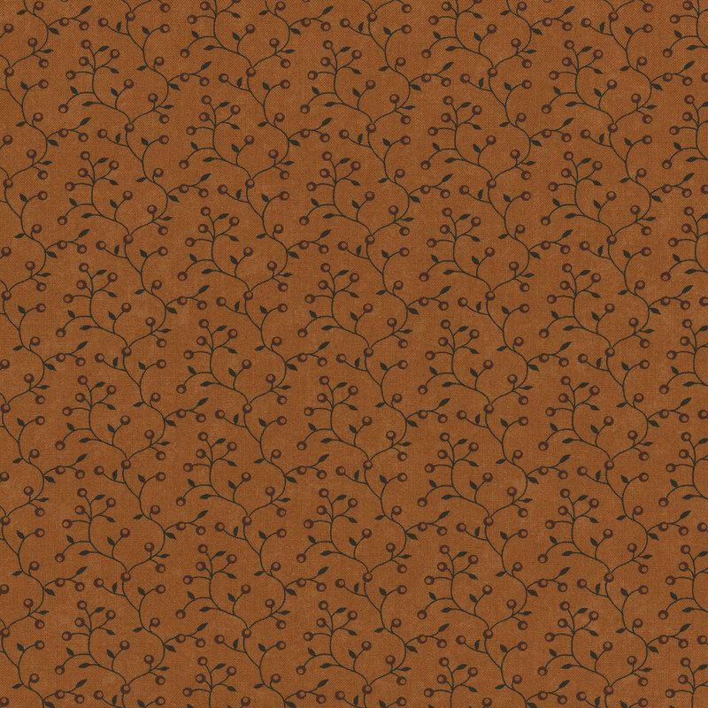 A patterned fabric in warm brown with black branches and small leaves scattered throughout.