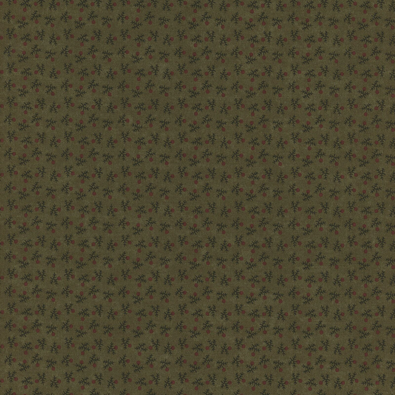 A close-up of a green fabric with a repeating pattern of small flowers in darker colors.