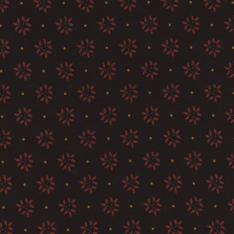 Black fabric with a repeating pattern of red flowers and small yellow dots.