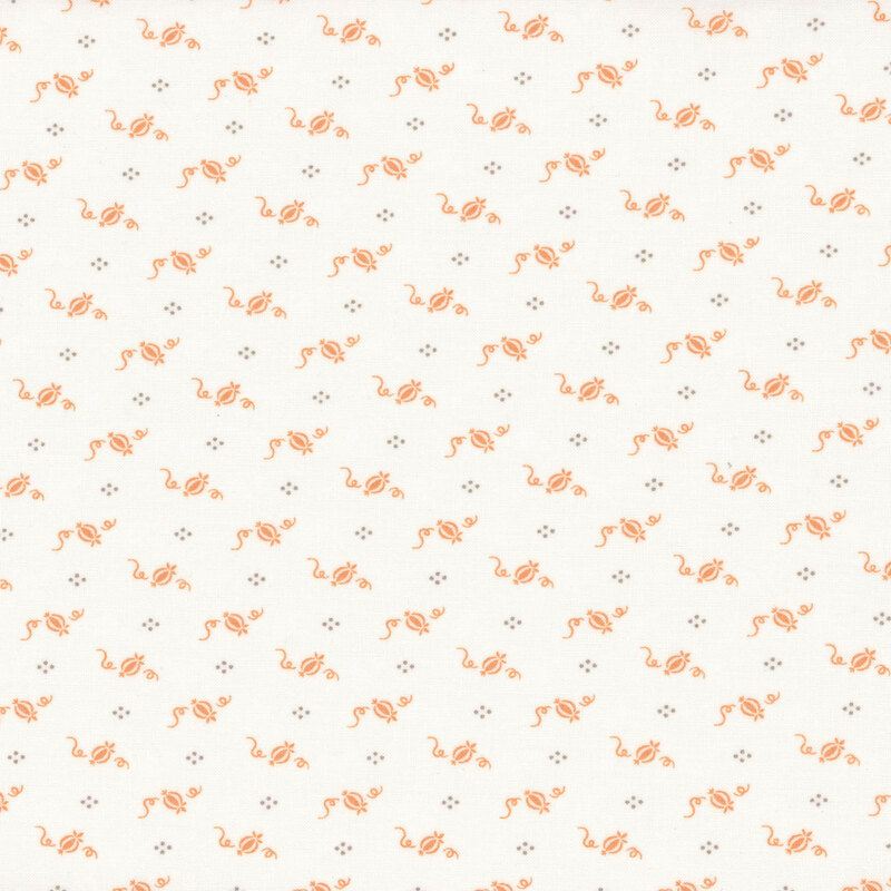 A light cream fabric with a repetitive pattern of small orange swirls and floral motifs.