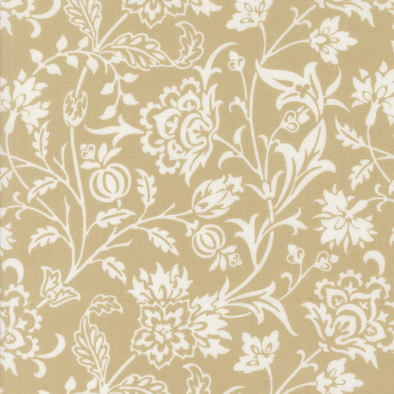 A beige fabric featuring white floral and vine patterns in an intricate design.