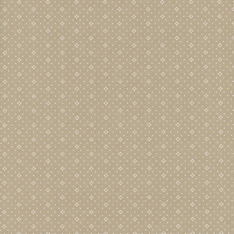 Beige fabric with a subtle pattern of small white stars evenly spaced across the surface.