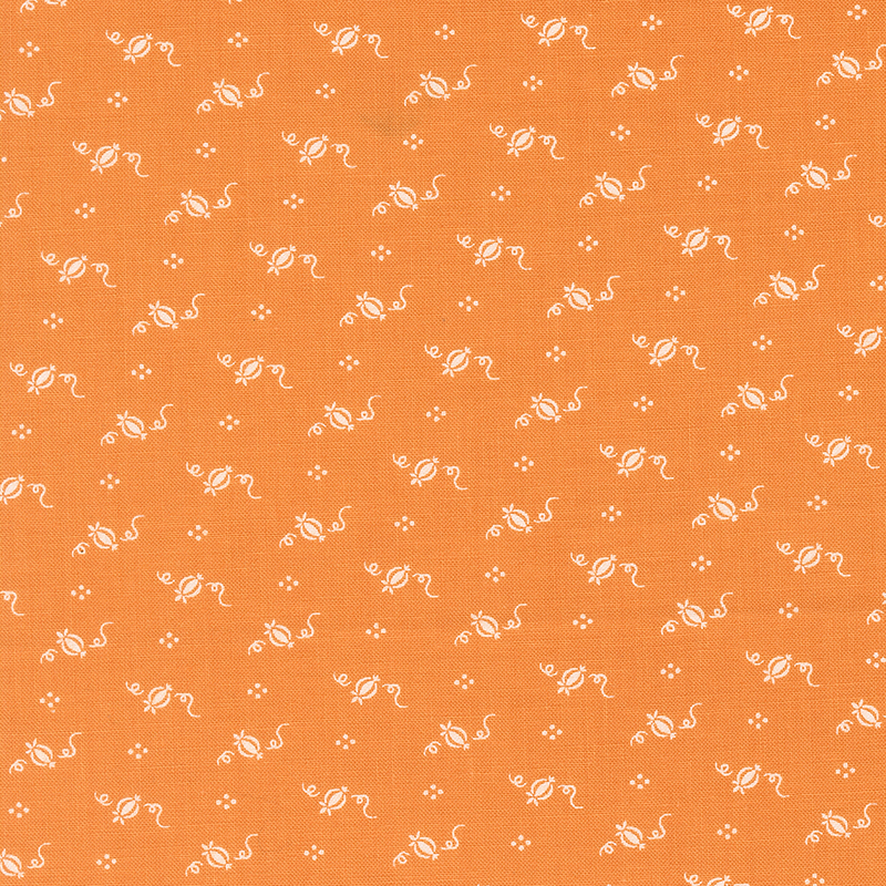 Orange fabric with a repeated white pattern of whimsical designs, including swirls and flowers.