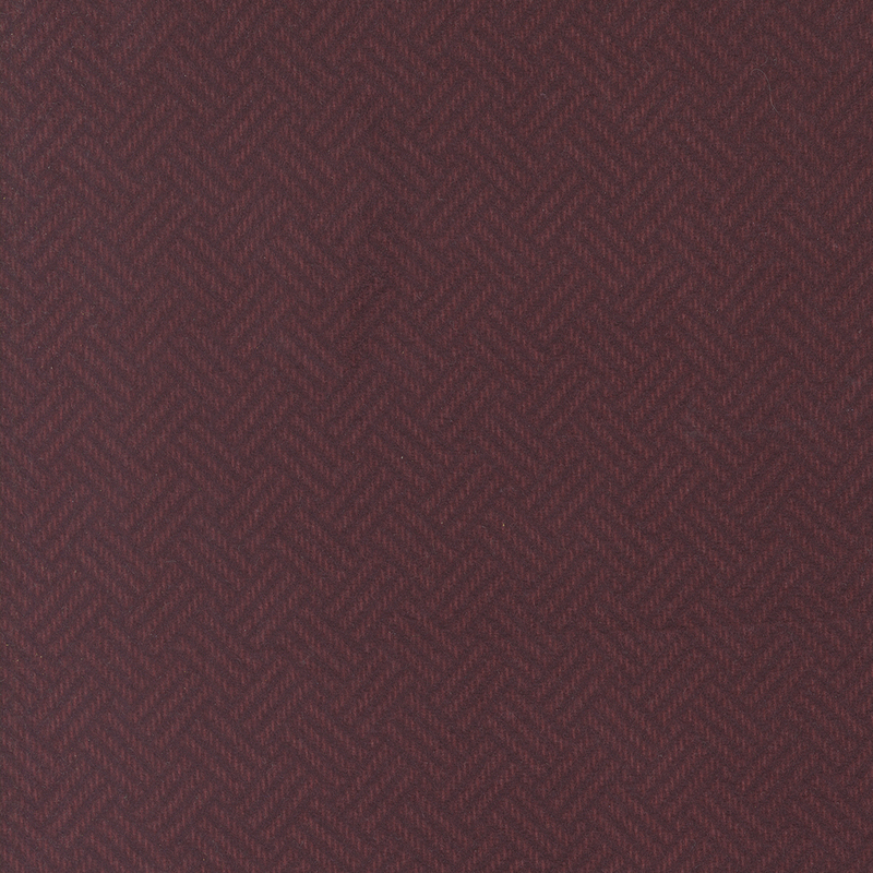 Dark burgundy fabric featuring a woven textured design