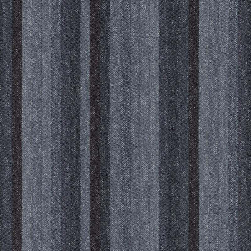 Fabric pattern featuring vertical stripes in various shades of blue and black.