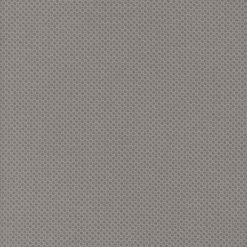 Light gray fabric with a subtle, textured pattern of tiny squares.