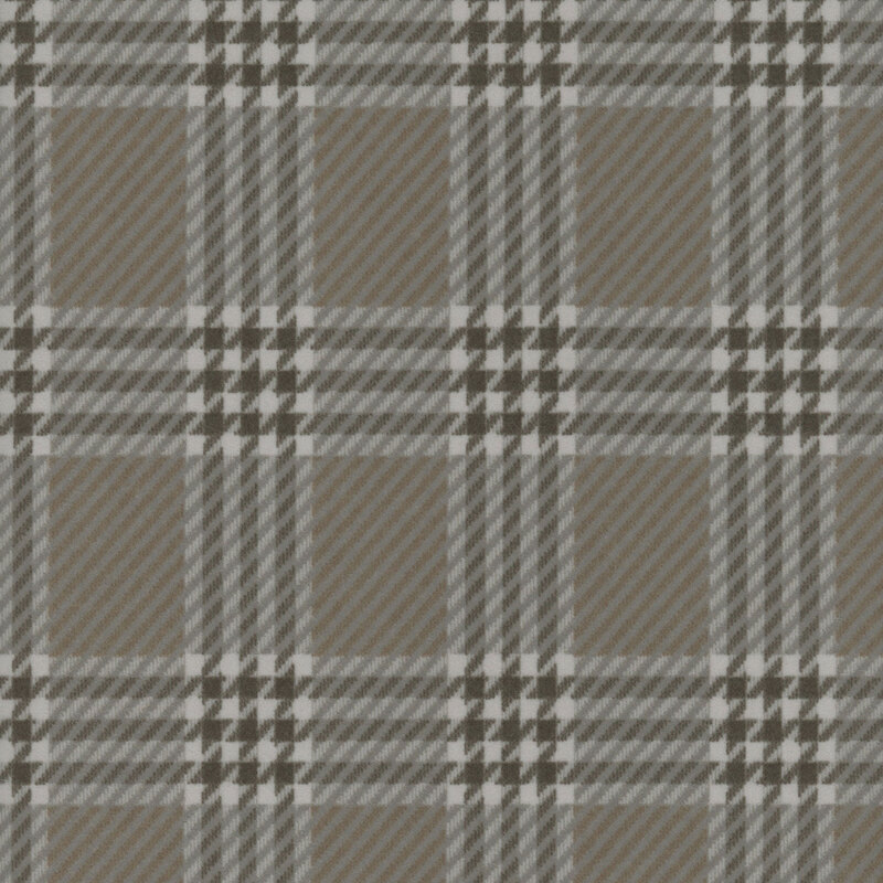 Plaid fabric pattern featuring shades of brown and gray with white accents.