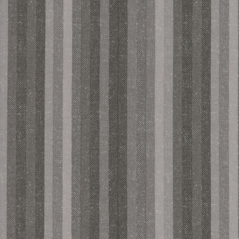 Fabric featuring alternating vertical stripes in shades of gray and cream.