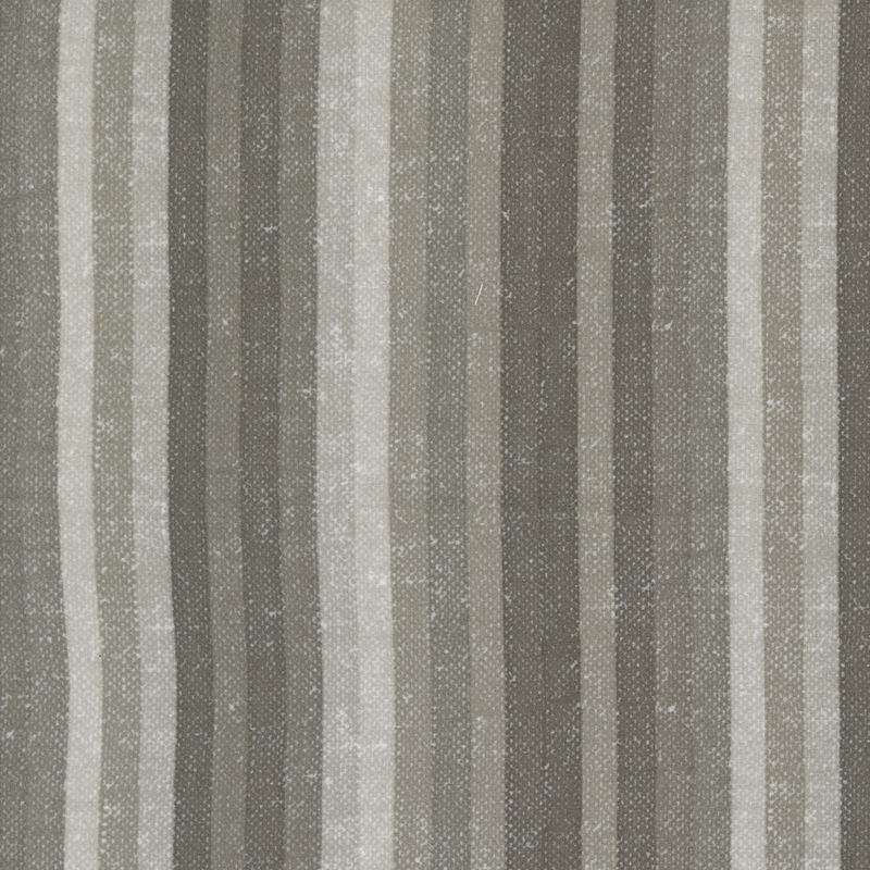 Fabric featuring alternating vertical stripes in shades of gray and cream.