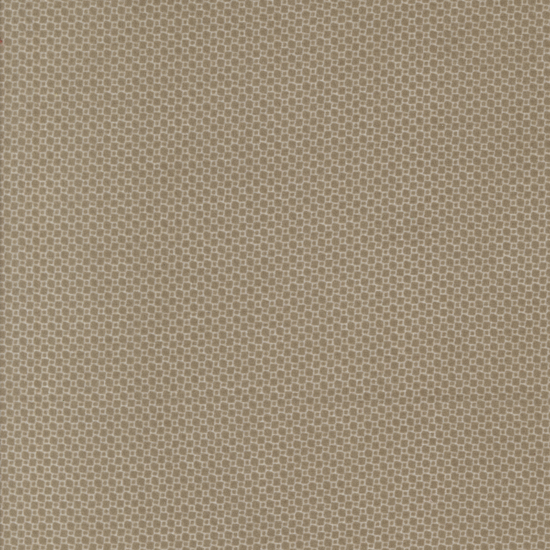 Light brown fabric with a subtle, textured pattern of tiny squares.