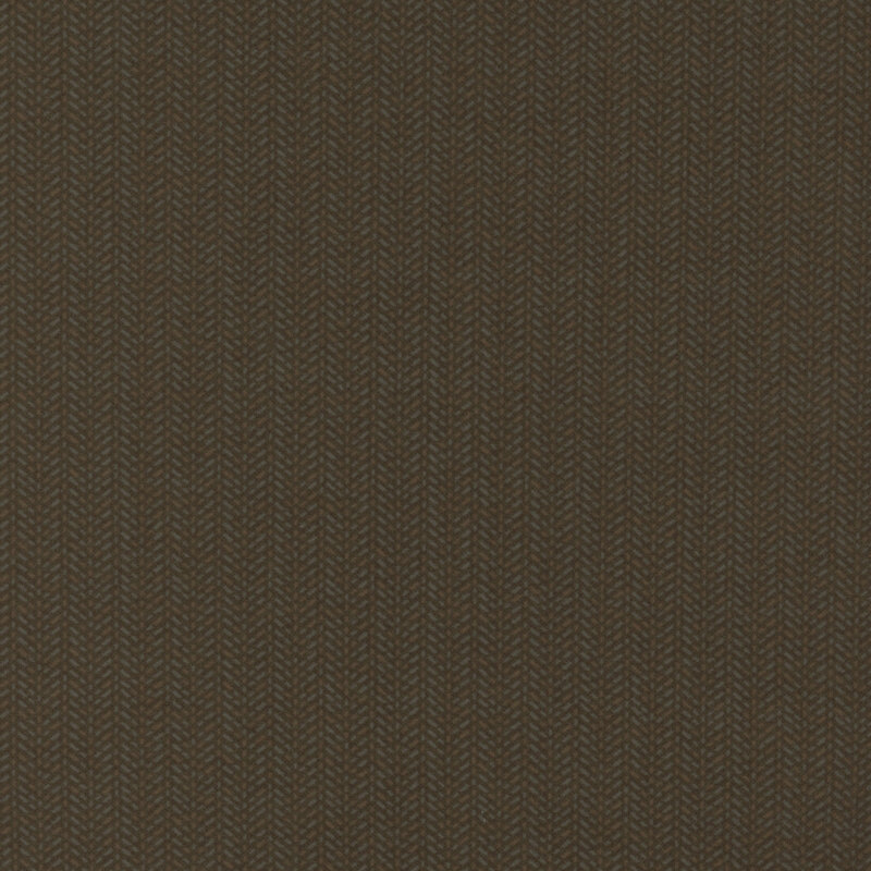 Fabric with a vertical herringbone pattern in muted brown tones.