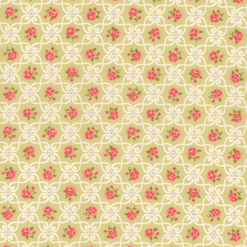 Light green fabric with a floral pattern featuring pink roses and white swirling lines.