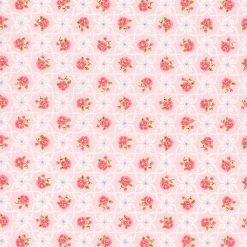 Repeating floral pattern with pink roses and blue flowers on a light pink background.