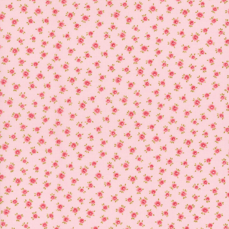 A pink fabric with small, scattered floral patterns in shades of pink and green.