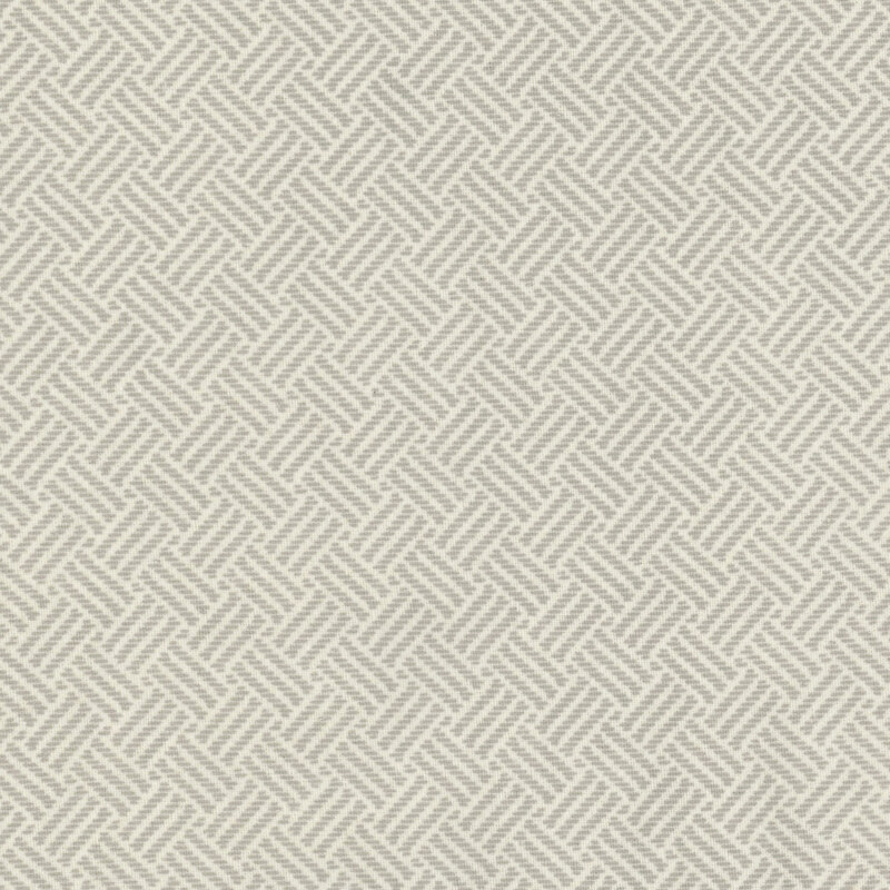 Fabric with a subtle tonal cross hatch pattern in muted gray tones.
