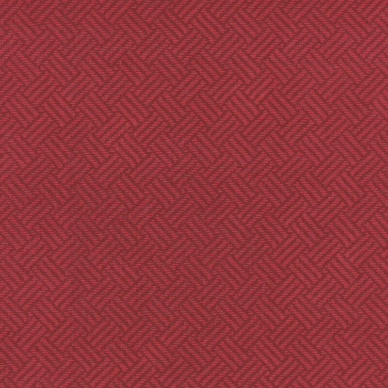 Fabric with a subtle tonal cross hatch pattern in red.