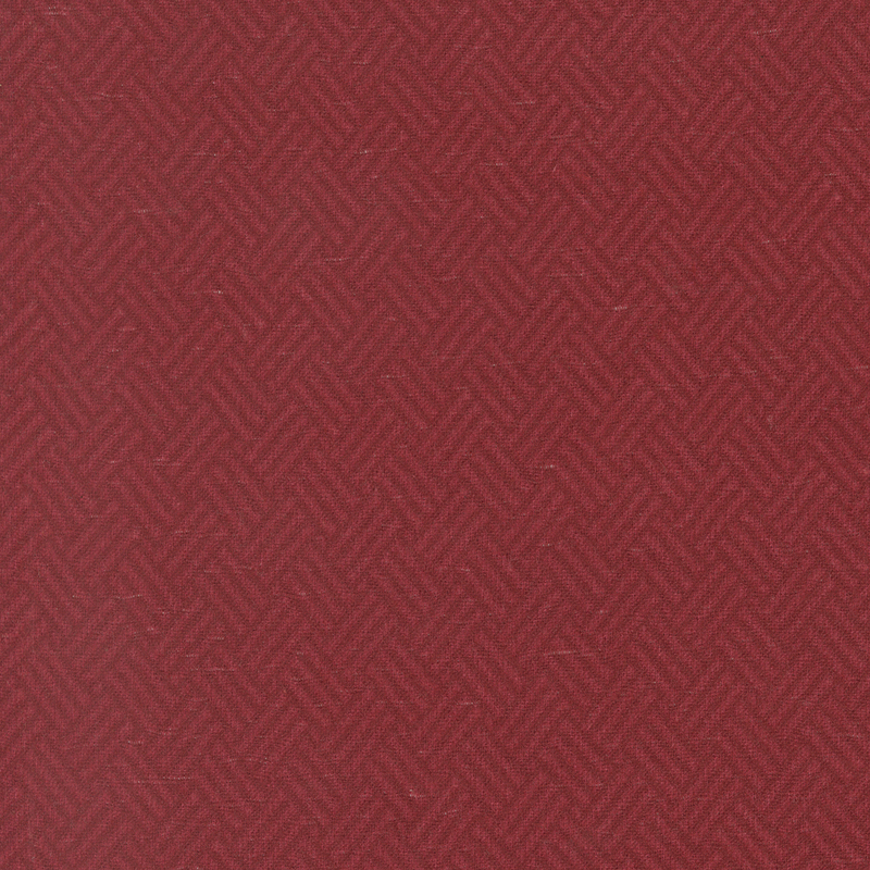 Red fabric featuring a herringbone pattern.