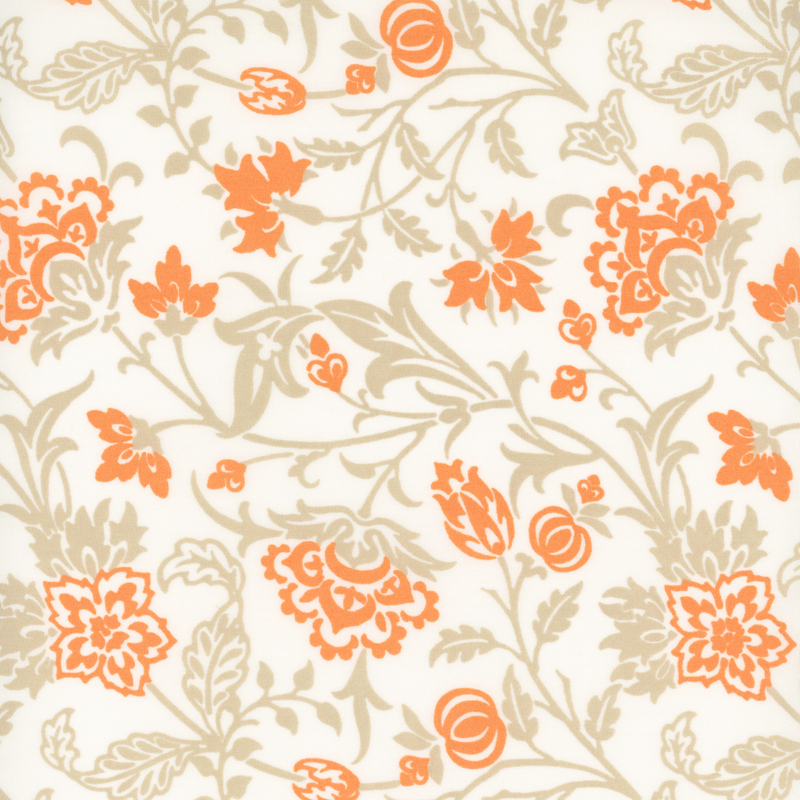 Floral fabric pattern featuring orange flowers and leaves on a cream background.
