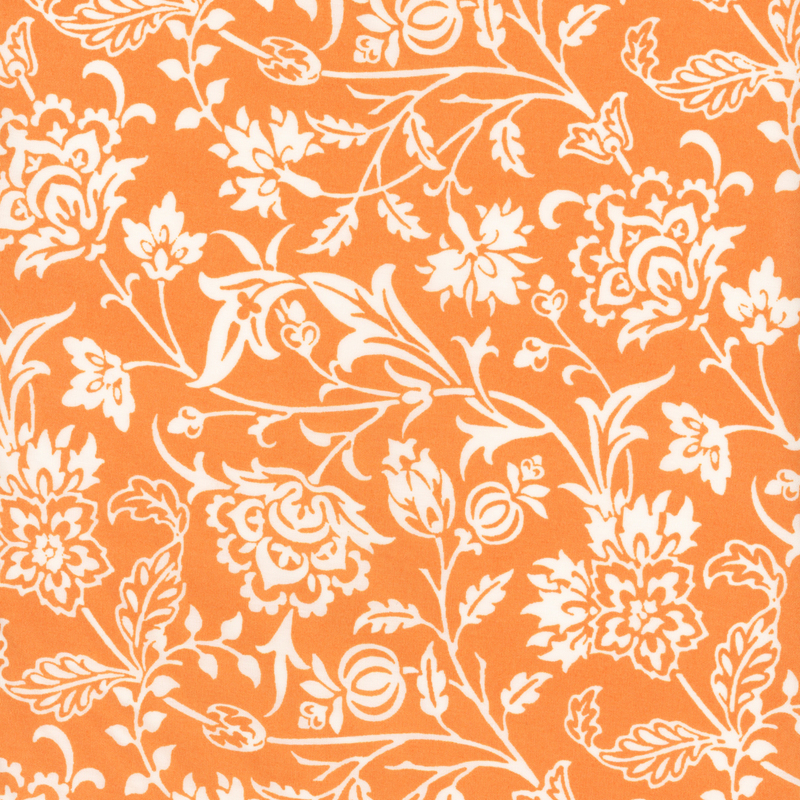 White floral pattern on a vibrant orange background.