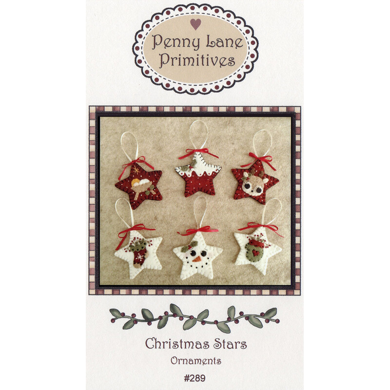 The front of the Christmas Stars pattern featuring the finished ornaments displayed on a wool background.