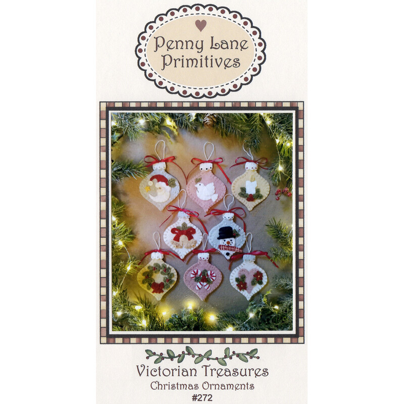 The front of the Victorian Treasures pattern featuring the finished ornaments displayed on a wool and holly-bound background.