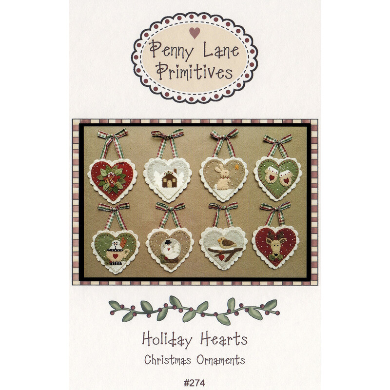 The front of the Holiday Hearts pattern featuring the finished ornaments displayed on a wool background.