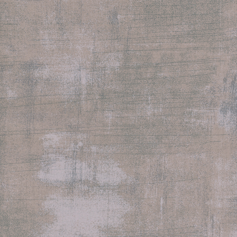 Gray fabric with bits of gray blue grunge texturing