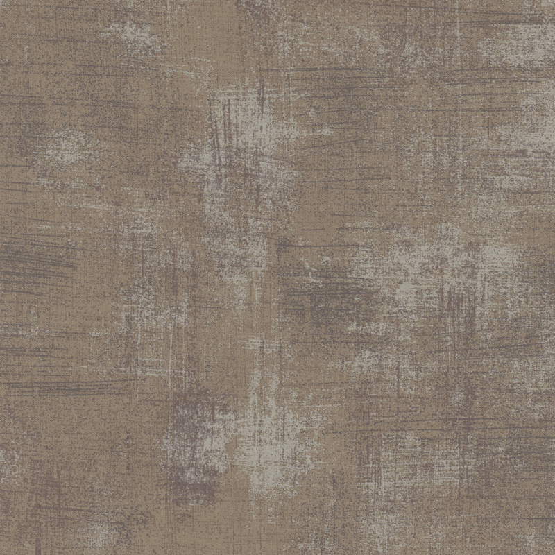 Warm gray fabric with bits of gray grunge texturing