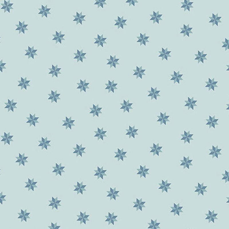 Repeated star pattern in light blue on a pale fabric.