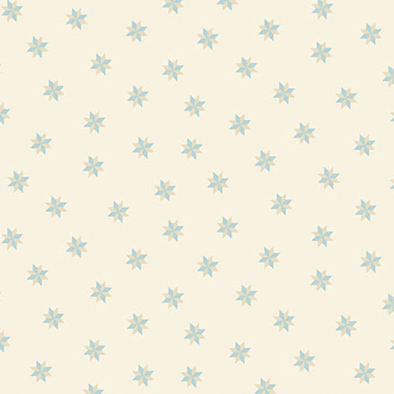 Light cream fabric patterned with small blue stars evenly spaced throughout.