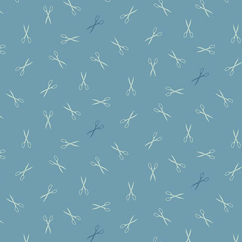 Pattern of light and dark blue scissors scattered on a teal fabric.